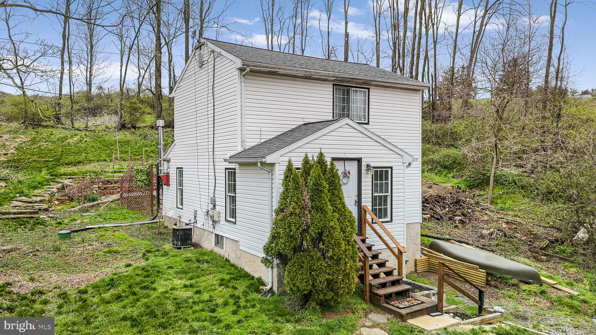 102 Paschall Mill Road West Grove, PA 19390 - Photo 2 of 29 a view of a yard in front of house