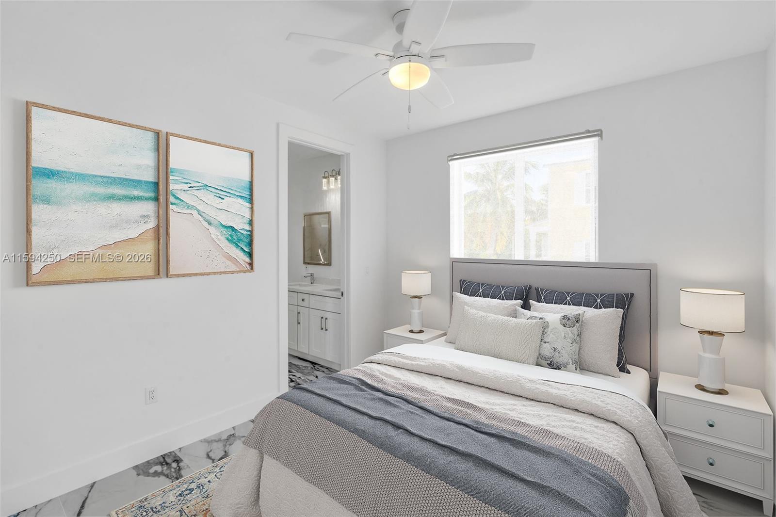84 Coral Way Key Largo, FL 33037 - Photo 17 of 55 a bedroom with a bed and a window