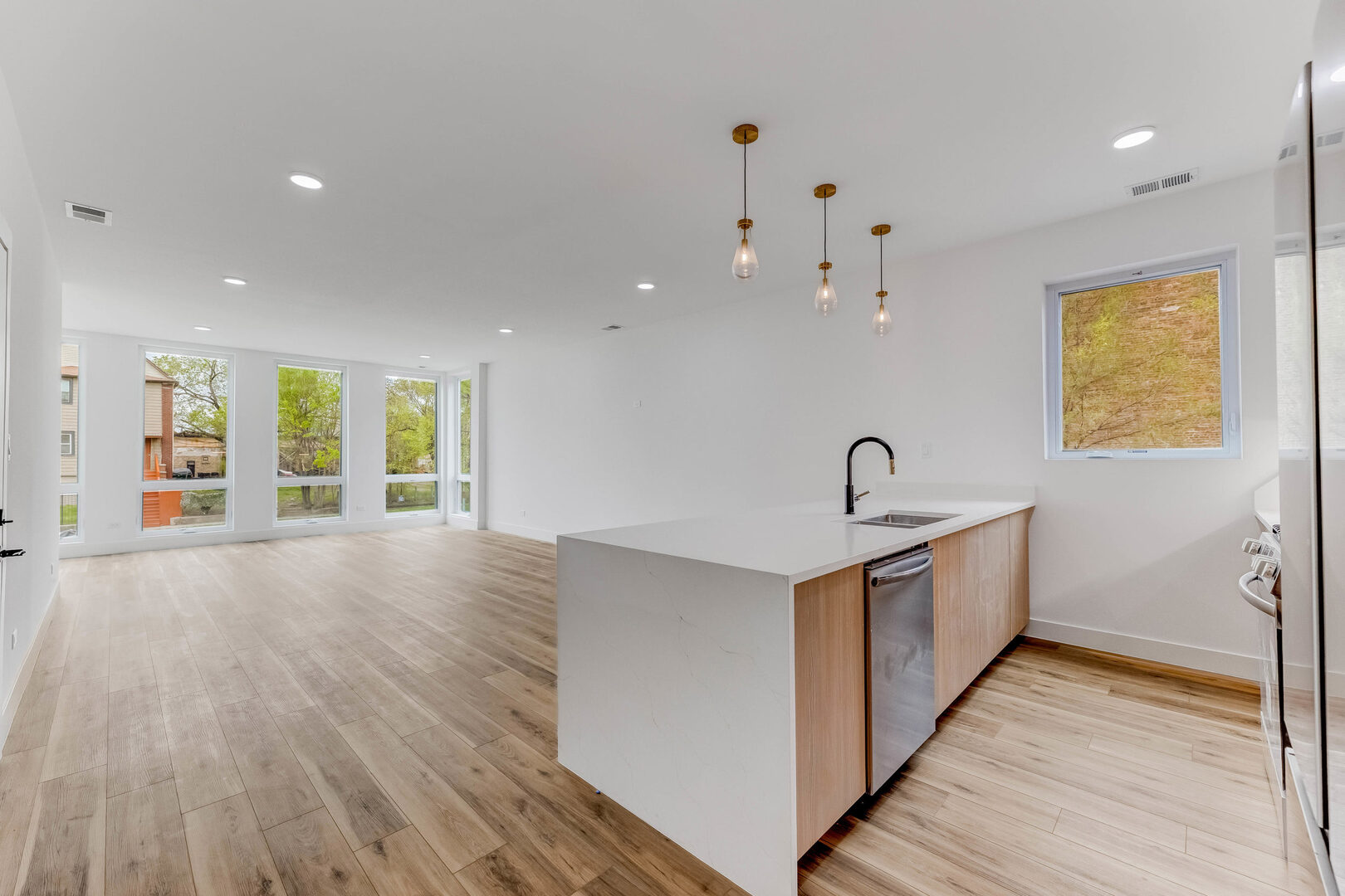 5921 South Calumet Avenue, Unit 2 Chicago, IL 60637 - Photo 11 of 40 a view of a big room with wooden floor and windows