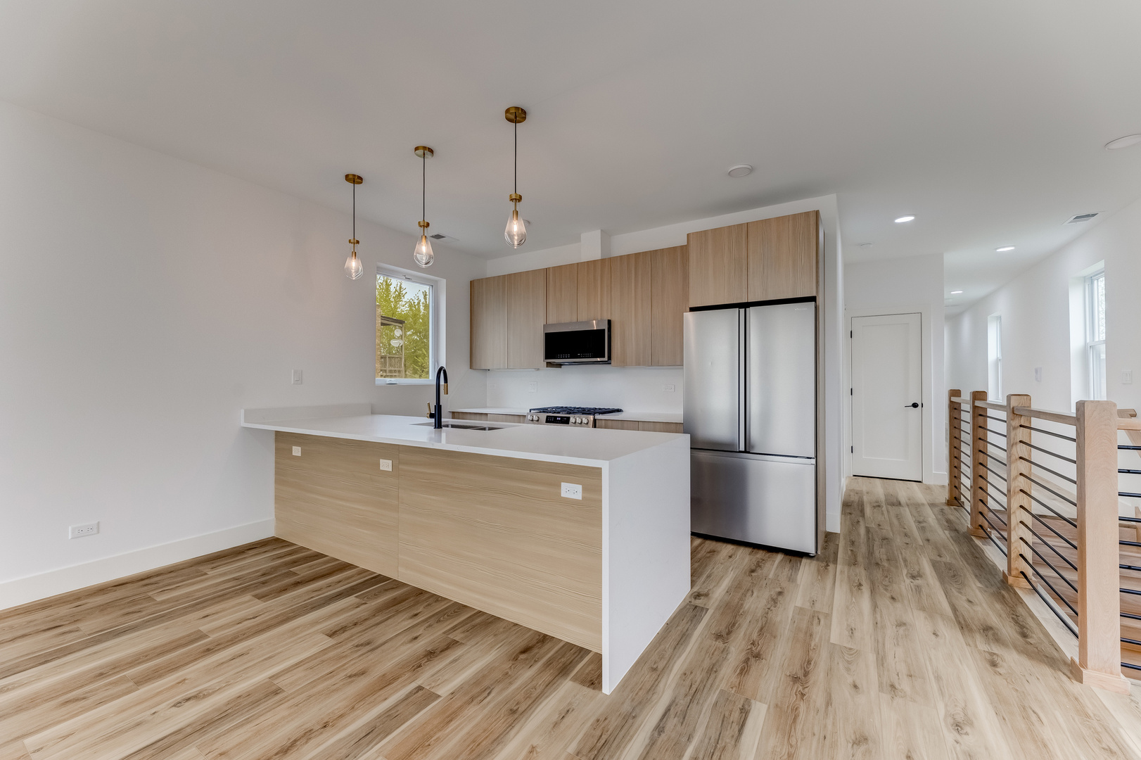 5921 South Calumet Avenue, Unit 2 Chicago, IL 60637 - Photo 24 of 40 a kitchen with stainless steel appliances a refrigerator and a stove top oven