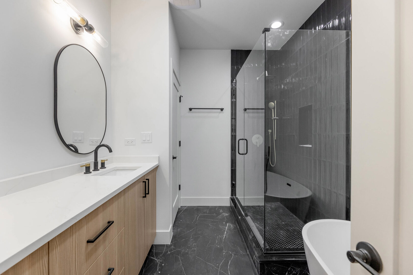 5921 South Calumet Avenue, Unit 2 Chicago, IL 60637 - Photo 6 of 40 a bathroom with a sink and a mirror