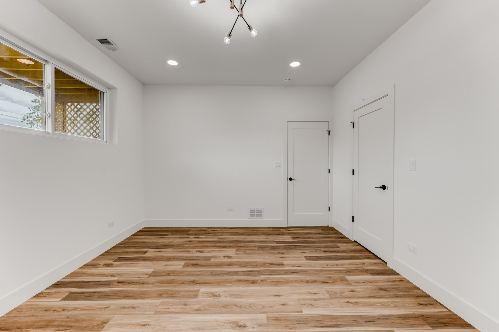 5921 South Calumet Avenue, Unit 2 Chicago, IL 60637 - Photo 9 of 40 a view of a room with wooden floor
