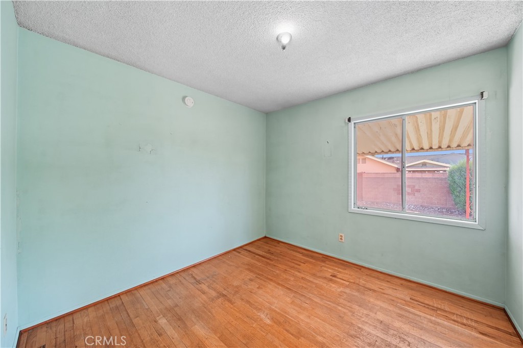 16402 Gridley Road Norwalk, CA 90650 - Photo 12 of 19 an empty room with a window