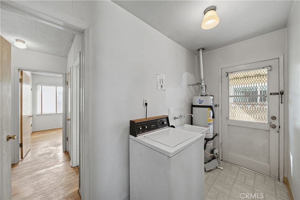 16402 Gridley Road Norwalk, CA 90650 - Photo 18 of 19 a room with storage and utility