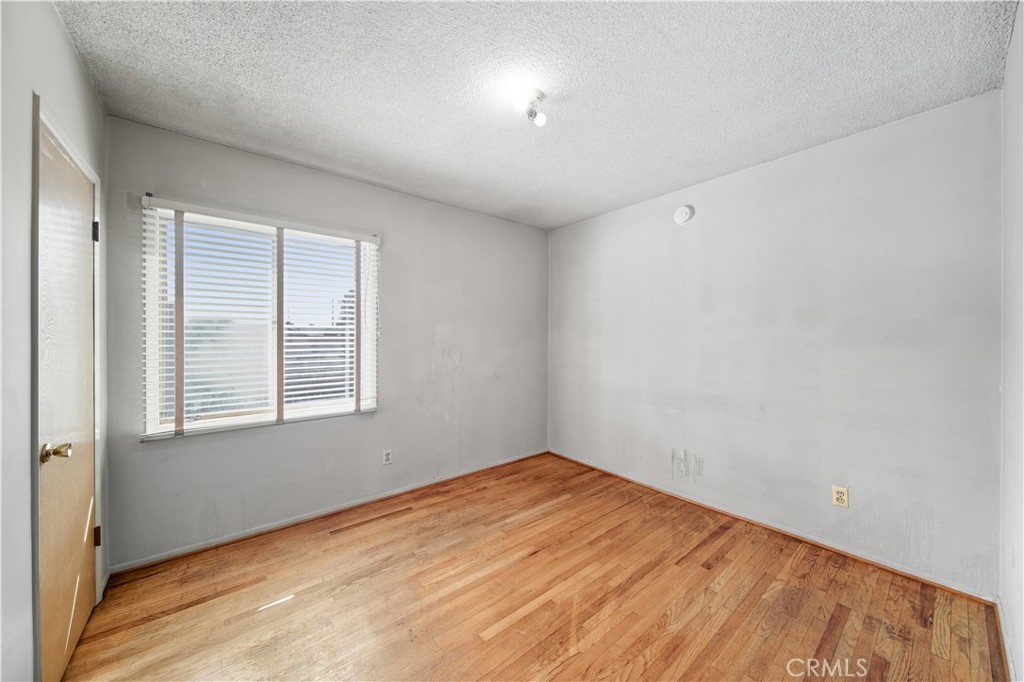 16402 Gridley Road Norwalk, CA 90650 - Photo 10 of 19 an empty room with a window
