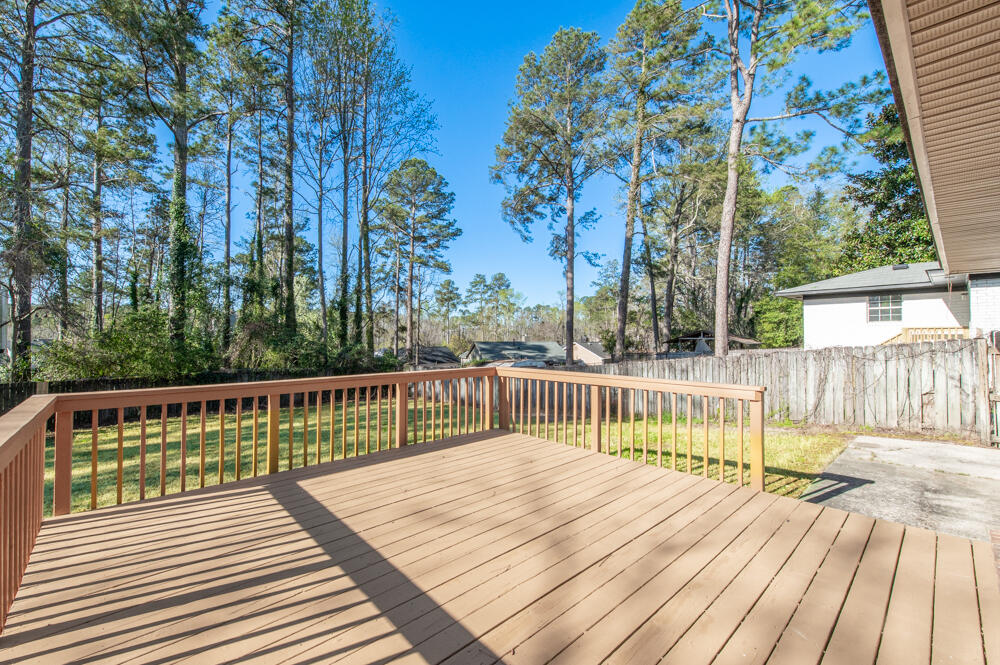335 Indian Trail Augusta, GA 30907 - Photo 18 of 24 a view of balcony with wooden floor and fence