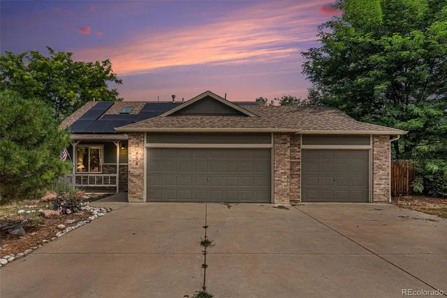 front view of a house with a garage