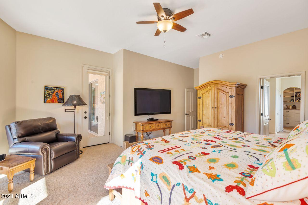 27802 North Quail Spring Road Rio Verde, AZ 85263 - Photo 12 of 35 a bedroom with a bed and a flat screen tv