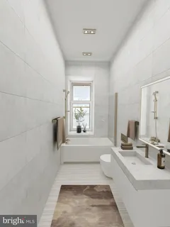 a bathroom with a bathtub sink and mirror