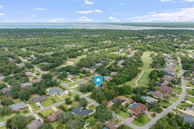 a view of an outdoor dining space with a patio