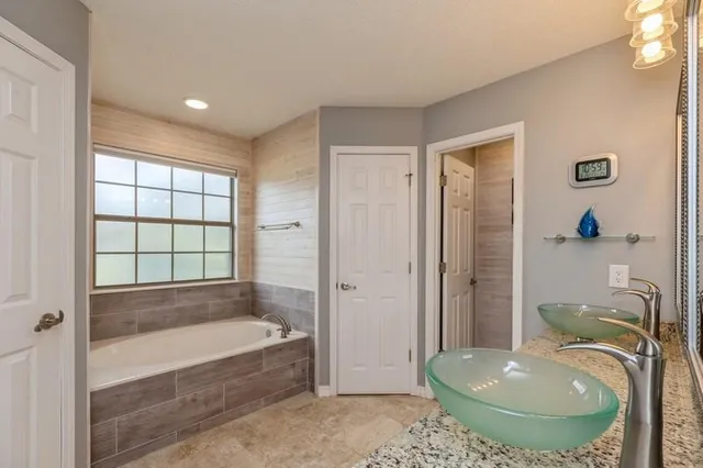 an aerial view of residential house with outdoor space