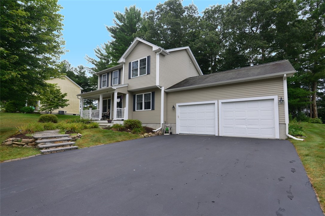 58 Scenic Way, Unit 50 Exeter, RI 02822 - Photo 2 of 27 Featuring an attached 2-car garage