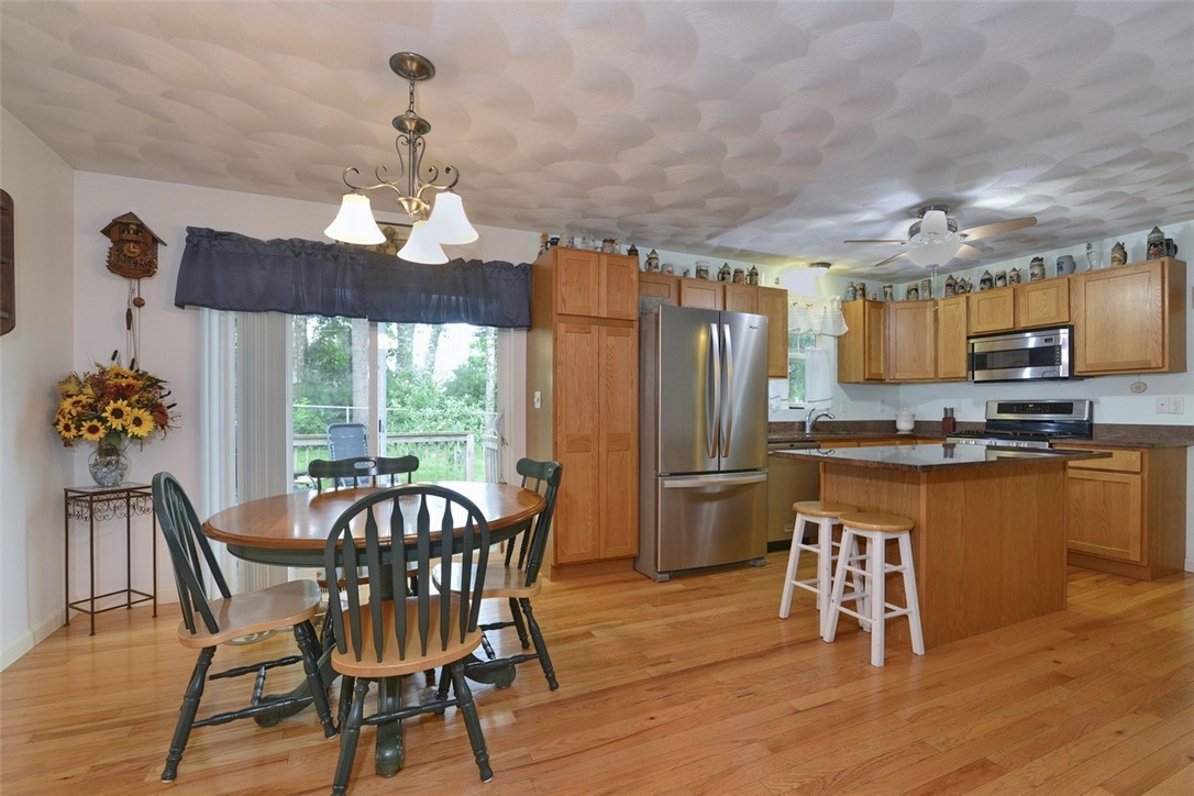 58 Scenic Way, Unit 50 Exeter, RI 02822 - Photo 7 of 27 Eat-in kitchen leading to deck