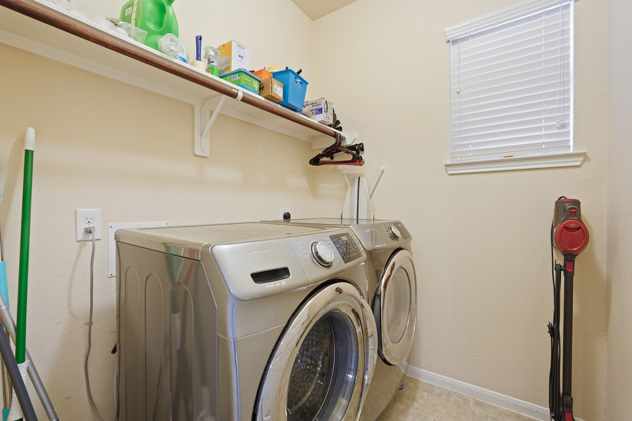 2027 Wembley Way Rosenberg, TX 77471 - Photo 22 of 28 a utility room with dryer and washer