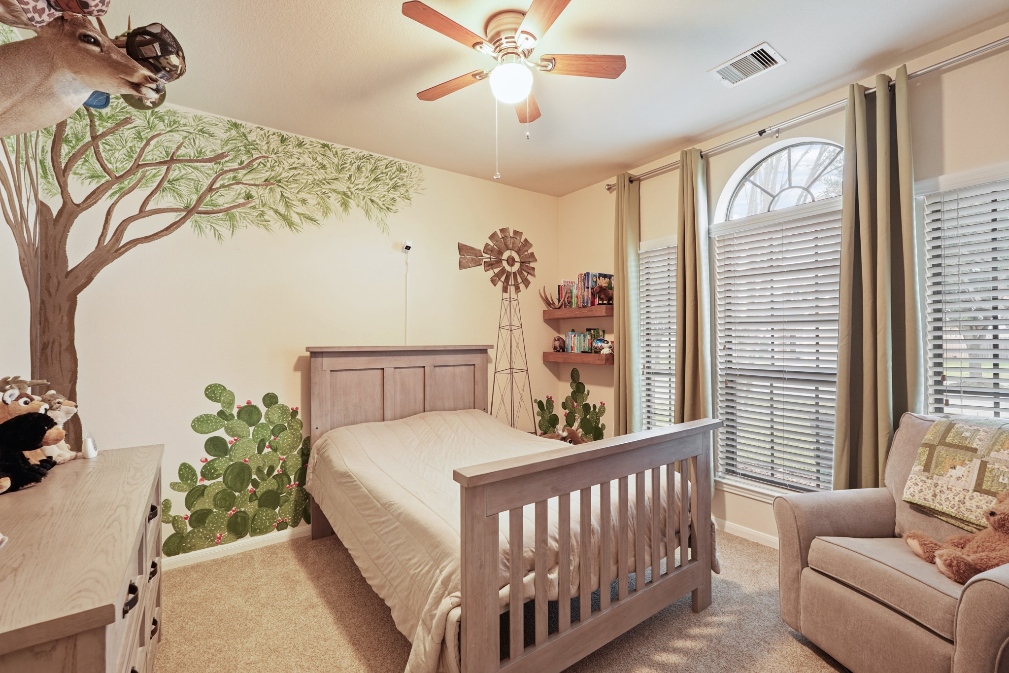 2027 Wembley Way Rosenberg, TX 77471 - Photo 5 of 28 a bed sitting in a bedroom next to a window