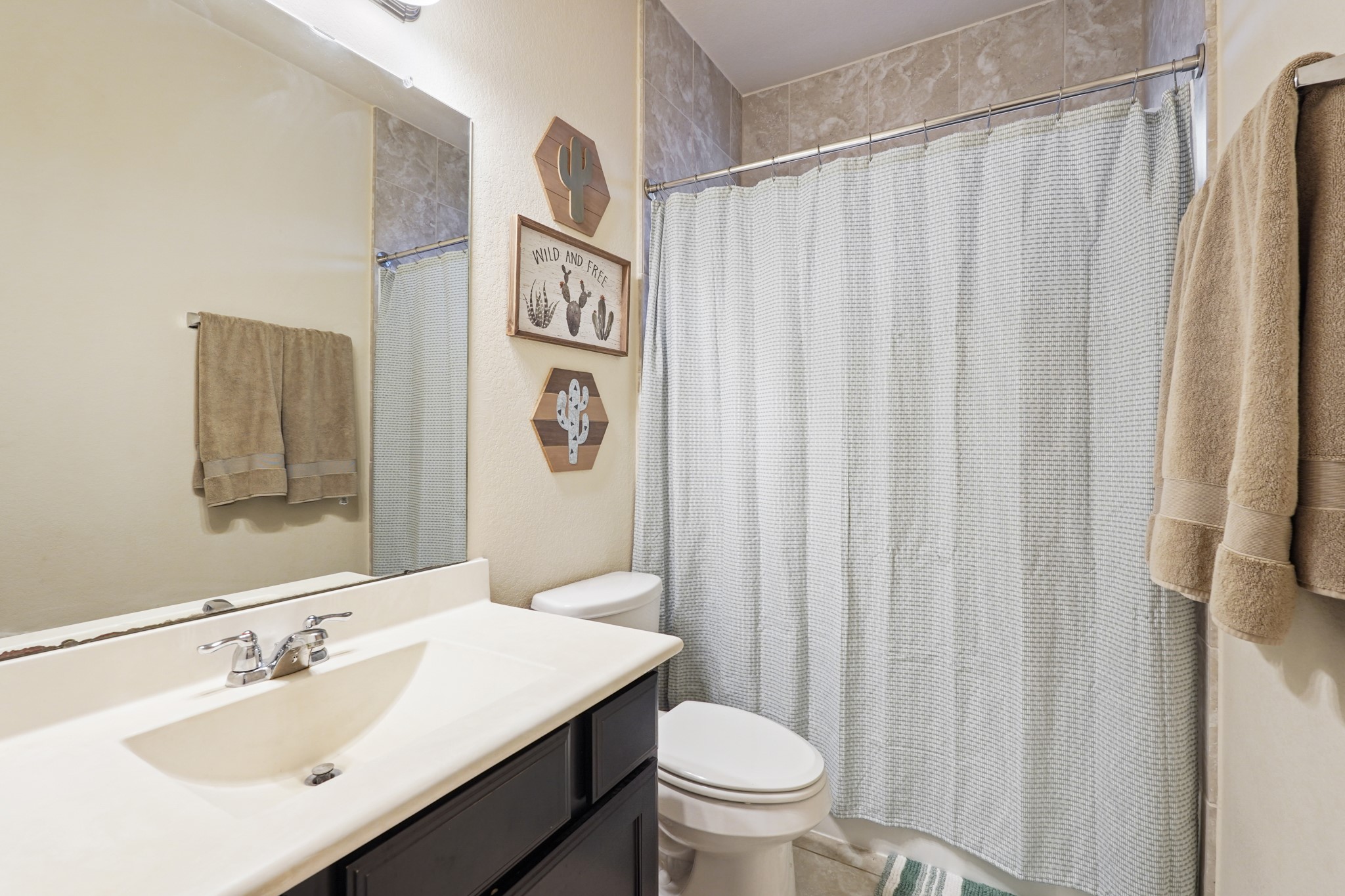 2027 Wembley Way Rosenberg, TX 77471 - Photo 6 of 28 a bathroom with a sink toilet and shower