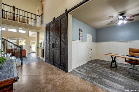 a view of a hallway with workspace
