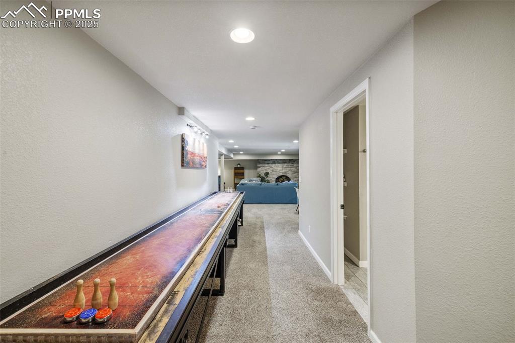 6940 Franciville Road Colorado Springs, CO 80908 - Photo 25 of 40 a hallway with wooden floor