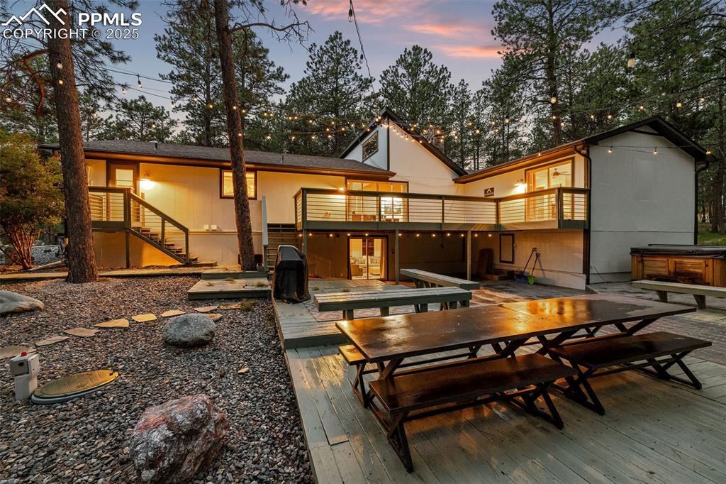 6940 Franciville Road Colorado Springs, CO 80908 - Photo 35 of 40 a backyard of a house with table and chairs