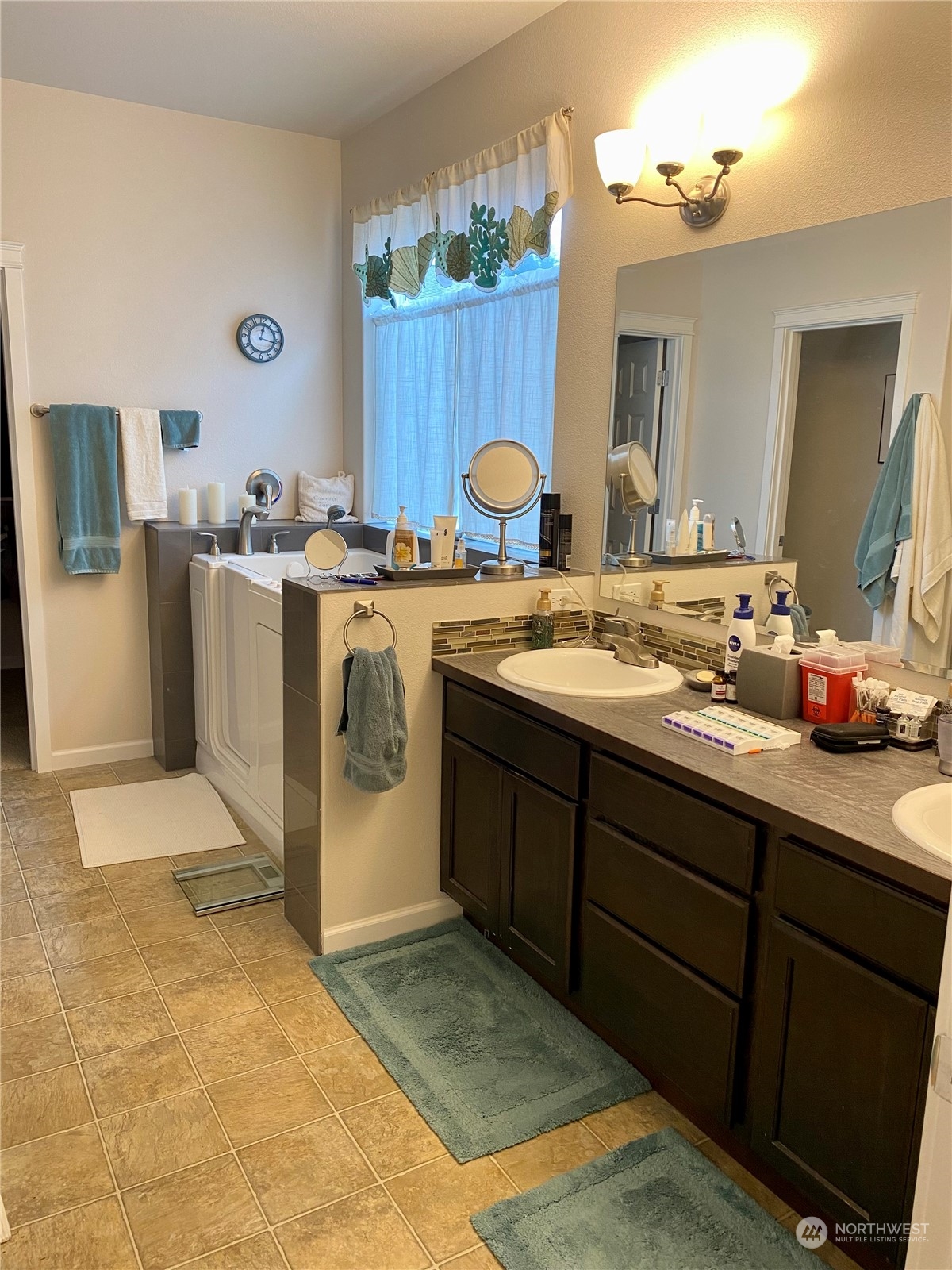802 Mandee Street Southeast Lacey, WA 98513 - Photo 13 of 28 a bathroom with a sink vanity granite and a mirror