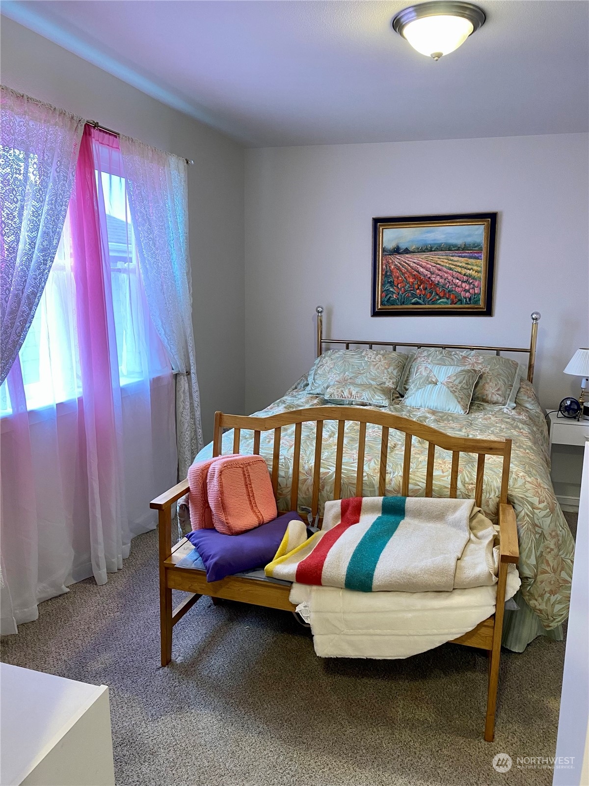 802 Mandee Street Southeast Lacey, WA 98513 - Photo 24 of 28 a bedroom with a bed and window