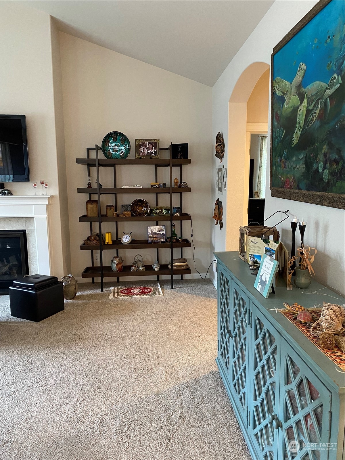 802 Mandee Street Southeast Lacey, WA 98513 - Photo 6 of 28 a view of a livingroom with furniture and a flat screen tv