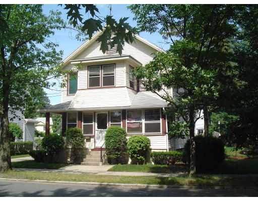 111-13 Audubon Street Springfield, MA 01108 - Photo 1 of 1 a front view of a house with a yard