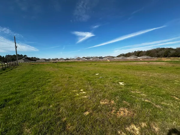 a view of an ocean from a city