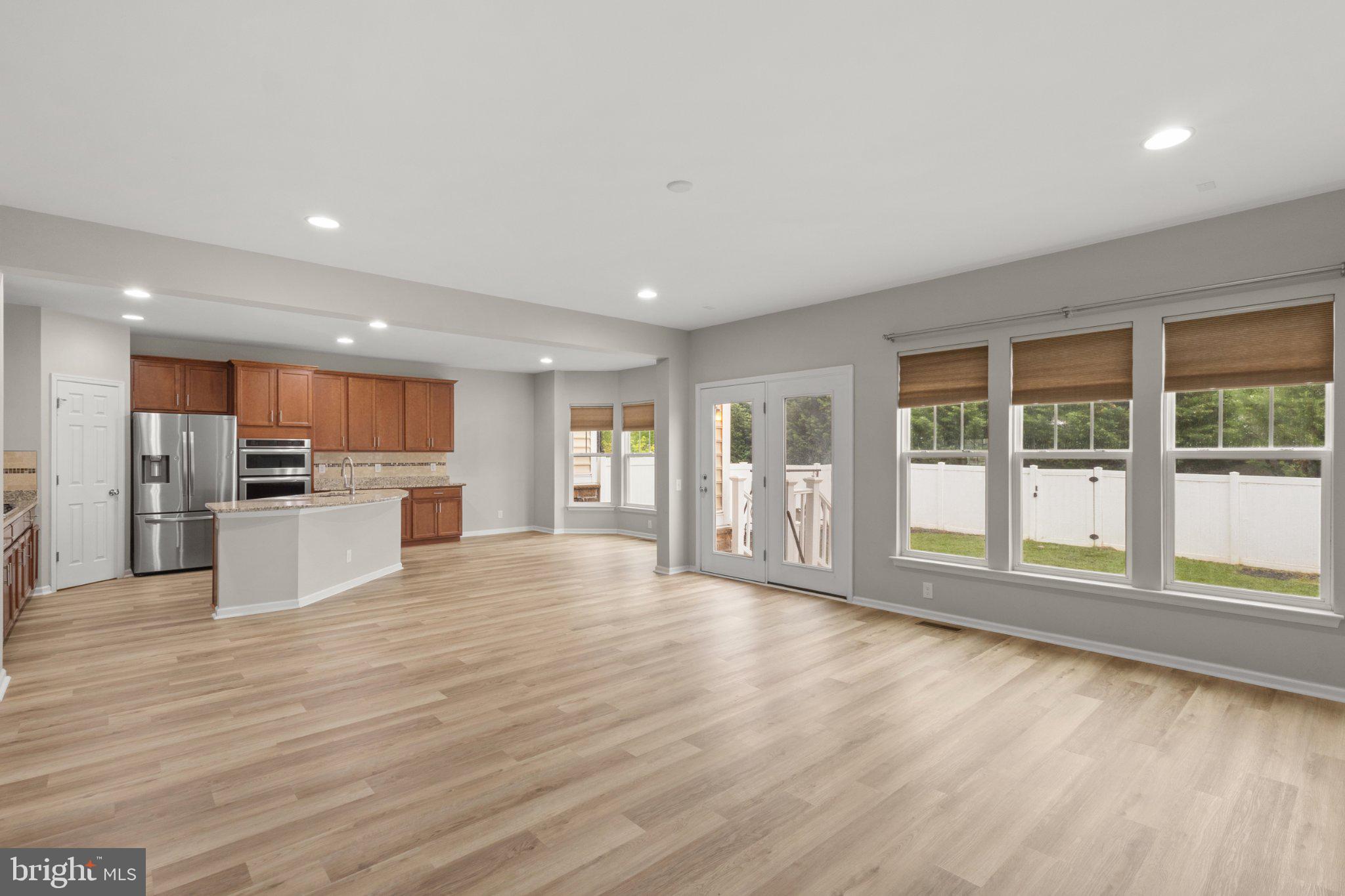 23542 Christina Ridge Square Ashburn, VA 20148 - Photo 41 of 41 Spacious, sunlit open floor plan.