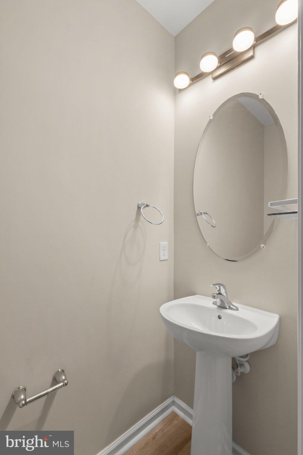 23542 Christina Ridge Square Ashburn, VA 20148 - Photo 13 of 41 Sleek and modern powder room design.
