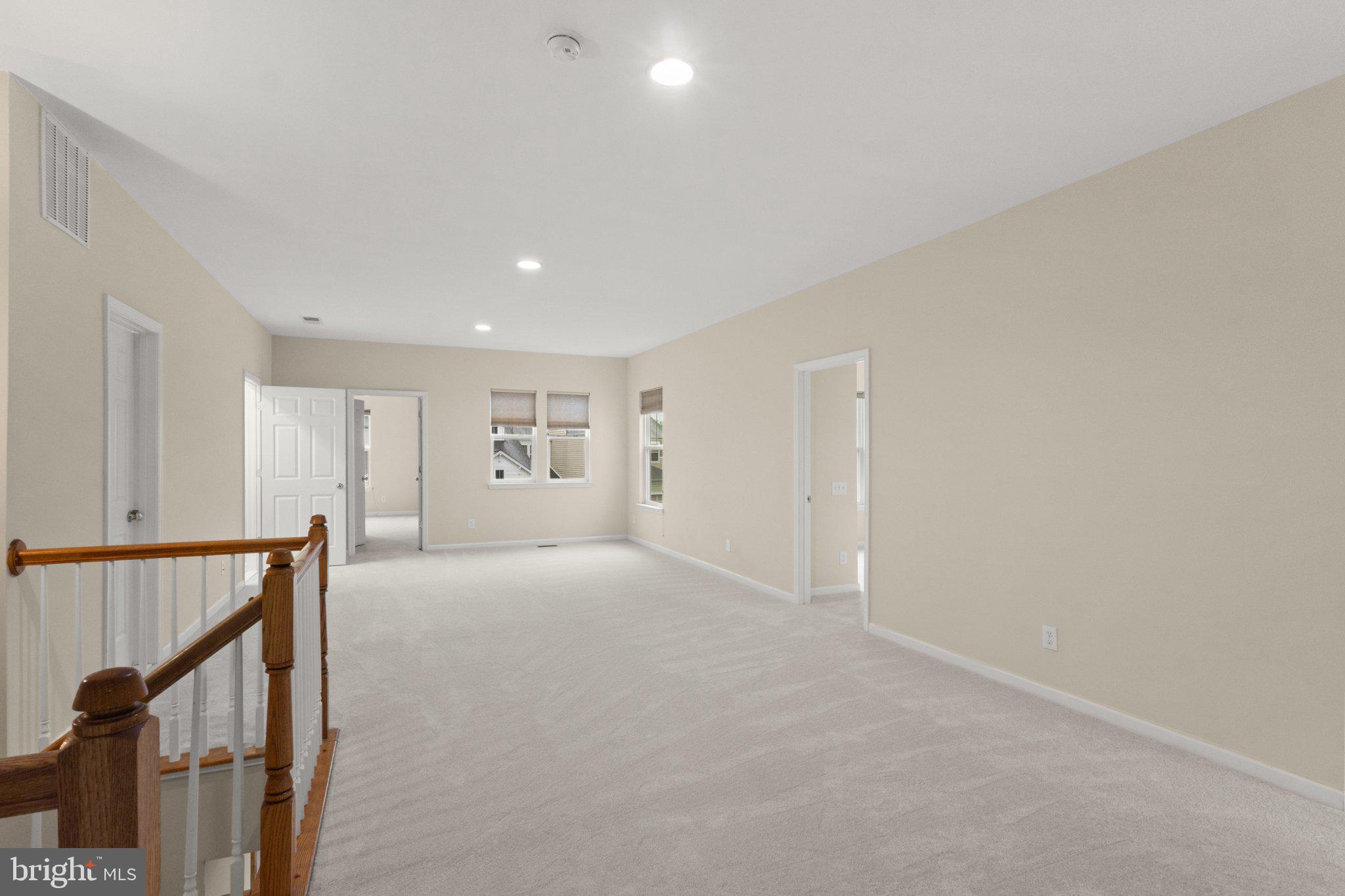 23542 Christina Ridge Square Ashburn, VA 20148 - Photo 18 of 41 Spacious, light-filled living area.