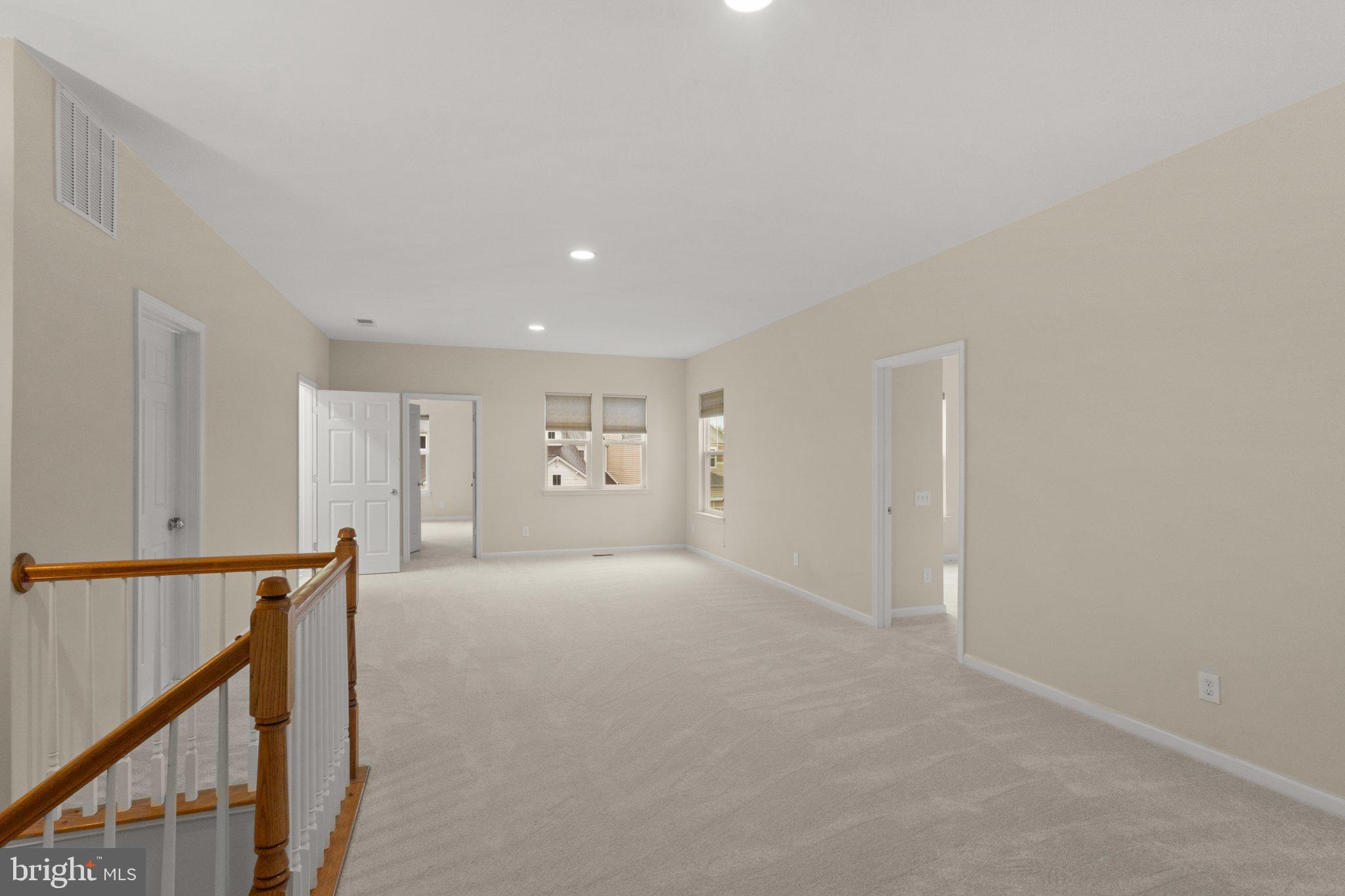 23542 Christina Ridge Square Ashburn, VA 20148 - Photo 19 of 41 Spacious, light-filled living area.
