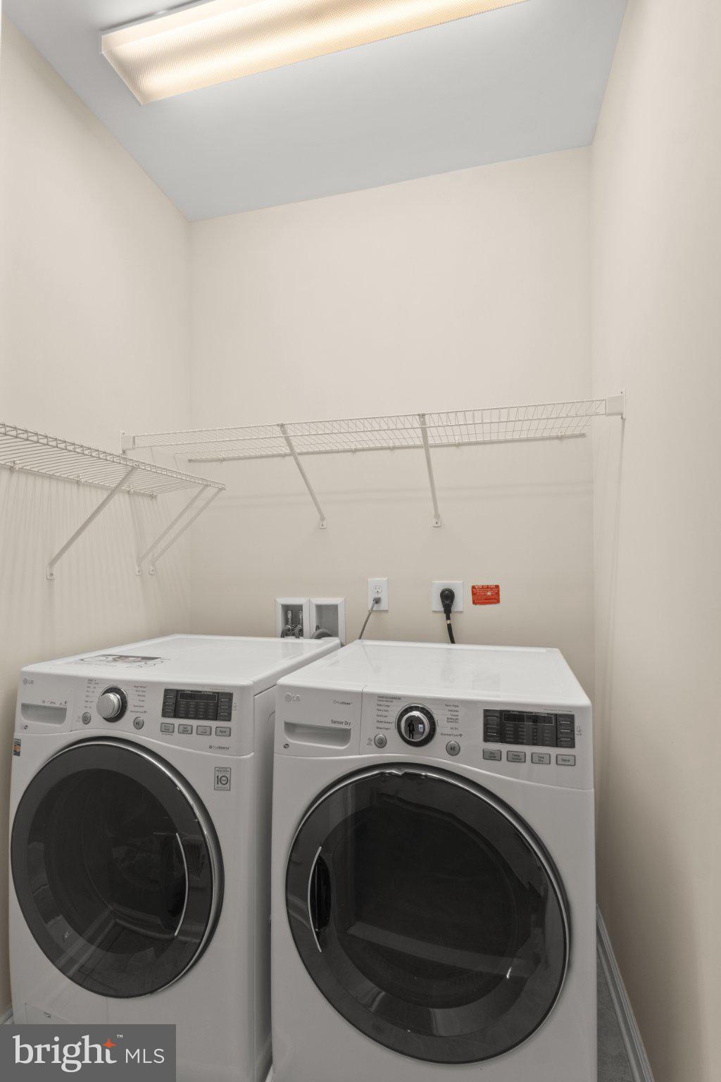 23542 Christina Ridge Square Ashburn, VA 20148 - Photo 28 of 41 Modern laundry space with sleek appliances.