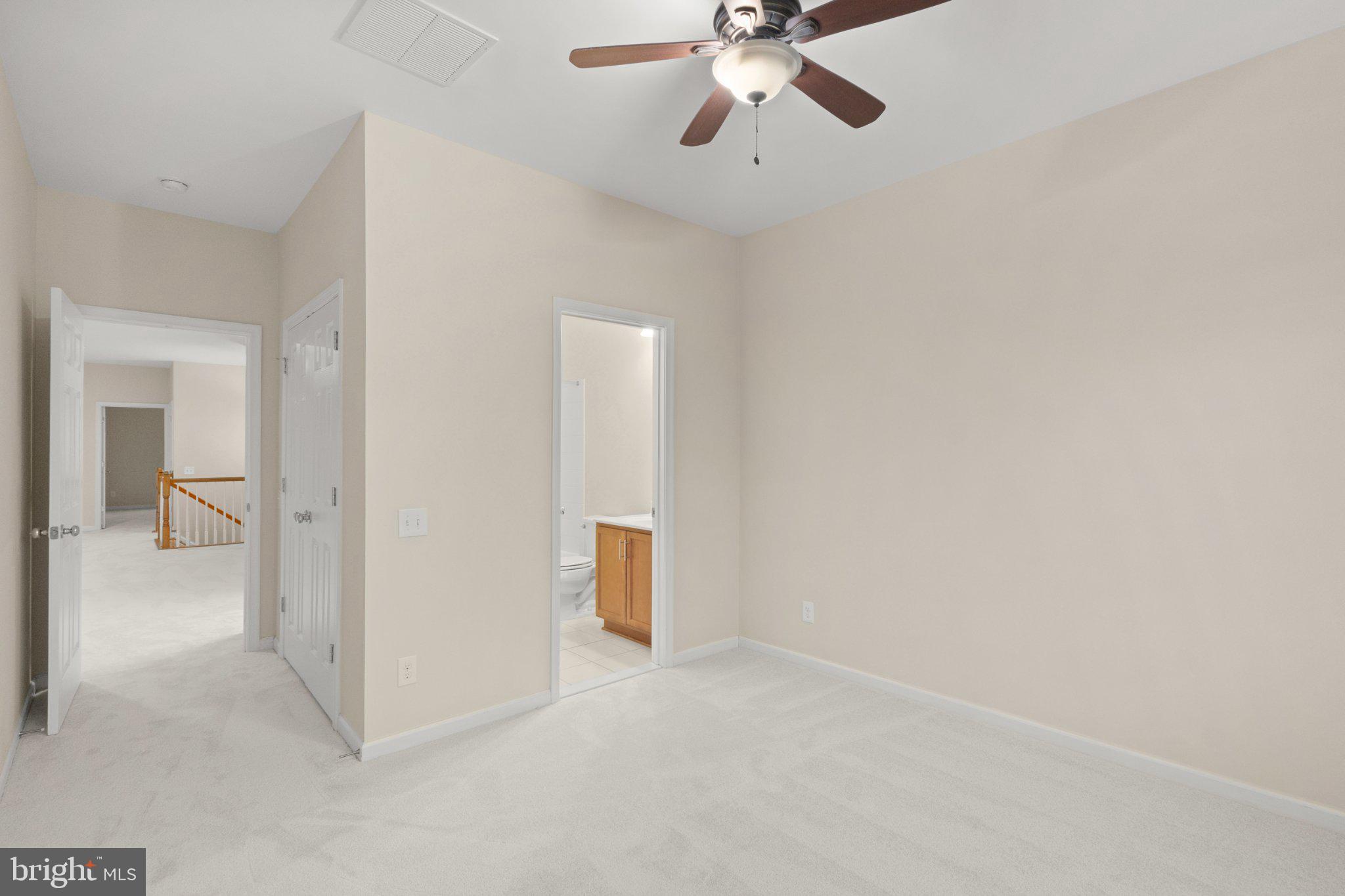 23542 Christina Ridge Square Ashburn, VA 20148 - Photo 32 of 41 Spacious room with soft, neutral tones.