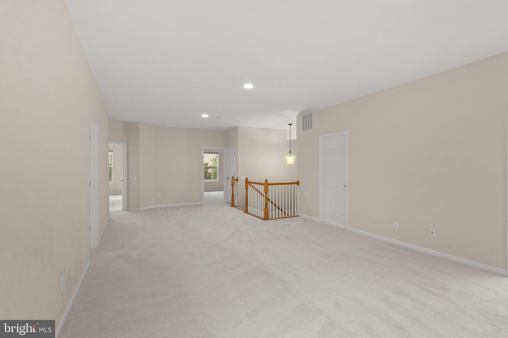 23542 Christina Ridge Square Ashburn, VA 20148 - Photo 34 of 41 Spacious, light-filled living area.