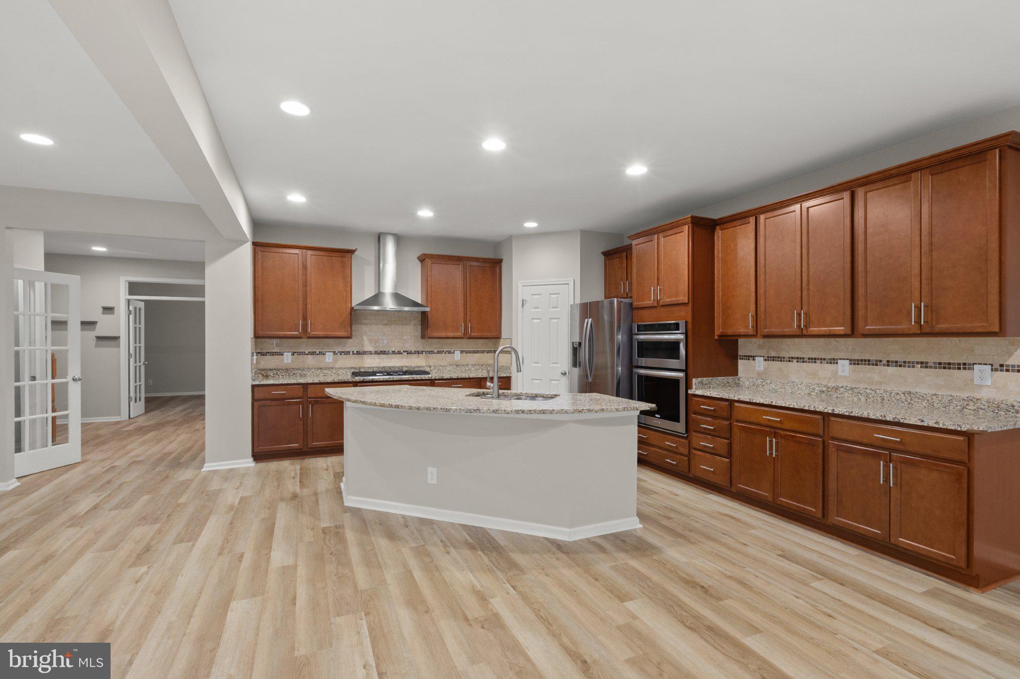 23542 Christina Ridge Square Ashburn, VA 20148 - Photo 8 of 41 Spacious modern kitchen with elegance.