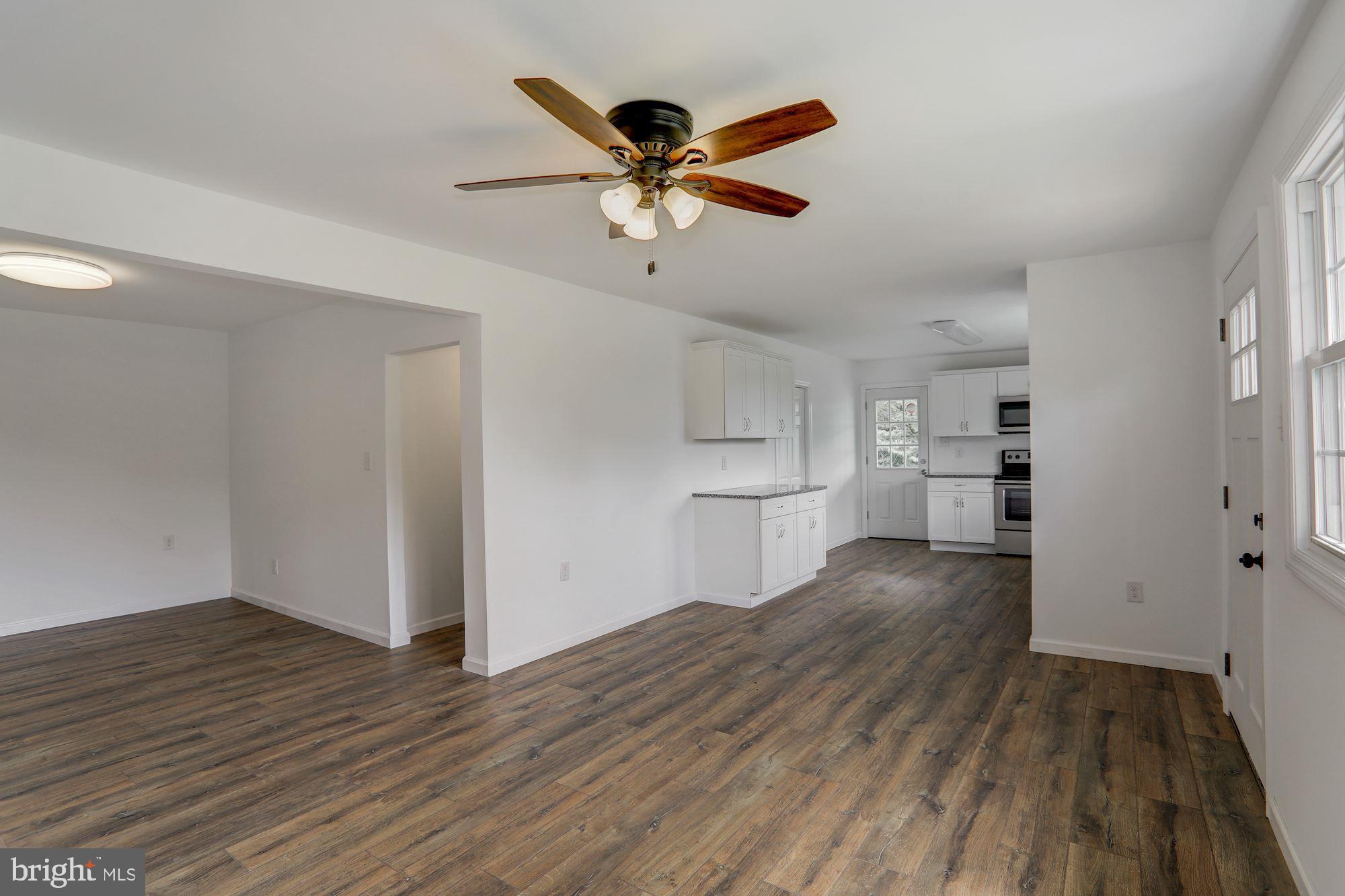 170 Compromise Road Woodstown, NJ 08098 - Photo 8 of 34 a view of empty room with wooden floor and ceiling fan