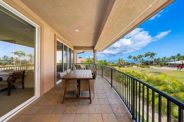 a view of balcony with furniture