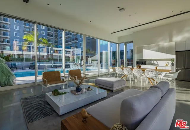 a view of water heater room with wooden floor