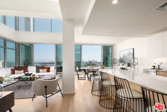 a work room with furniture and wooden floor