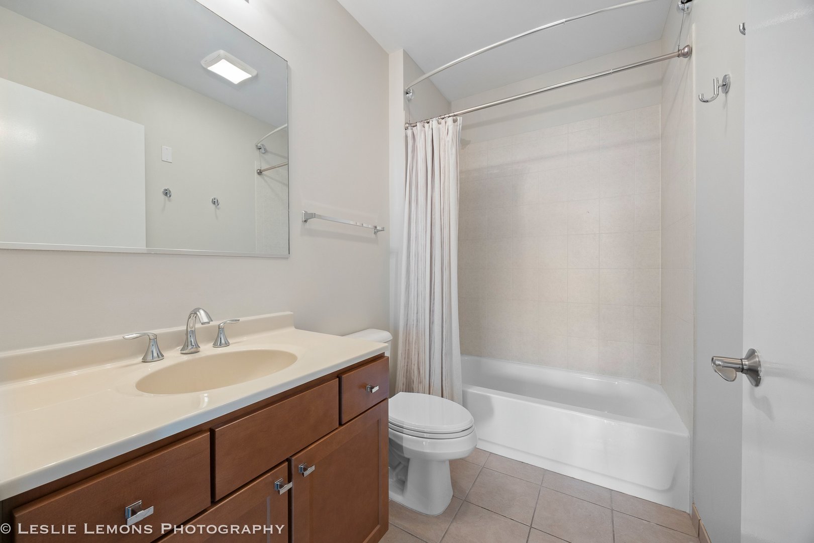 354 River Street, Unit 3407 Lemont, IL 60439 - Photo 14 of 15 a bathroom with a sink toilet and shower