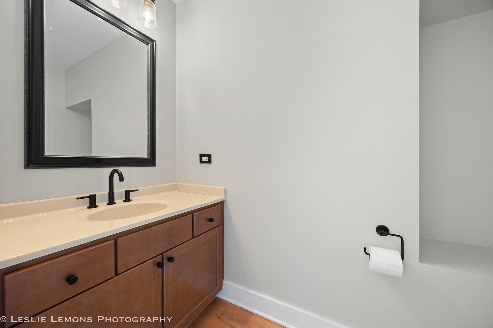 354 River Street, Unit 3407 Lemont, IL 60439 - Photo 8 of 15 a bathroom with a sink and a mirror