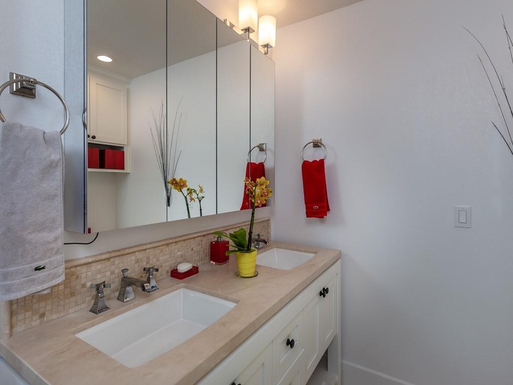 526 Fierro Loop Campbell, CA 95008 - Photo 16 of 27 a bathroom with a sink vanity and mirror