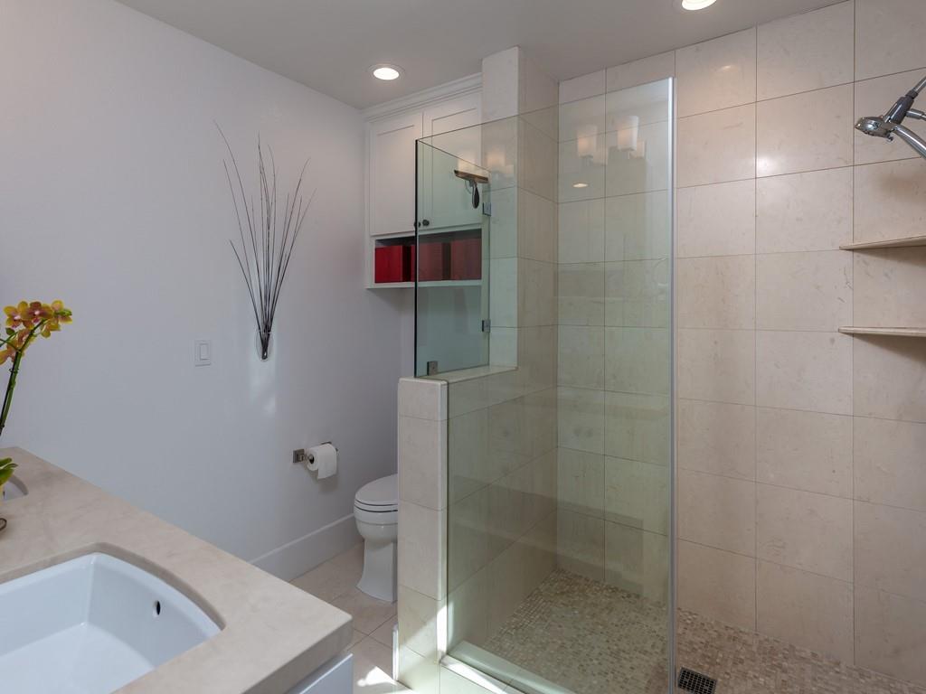 526 Fierro Loop Campbell, CA 95008 - Photo 17 of 27 a bathroom with a shower and a toilet