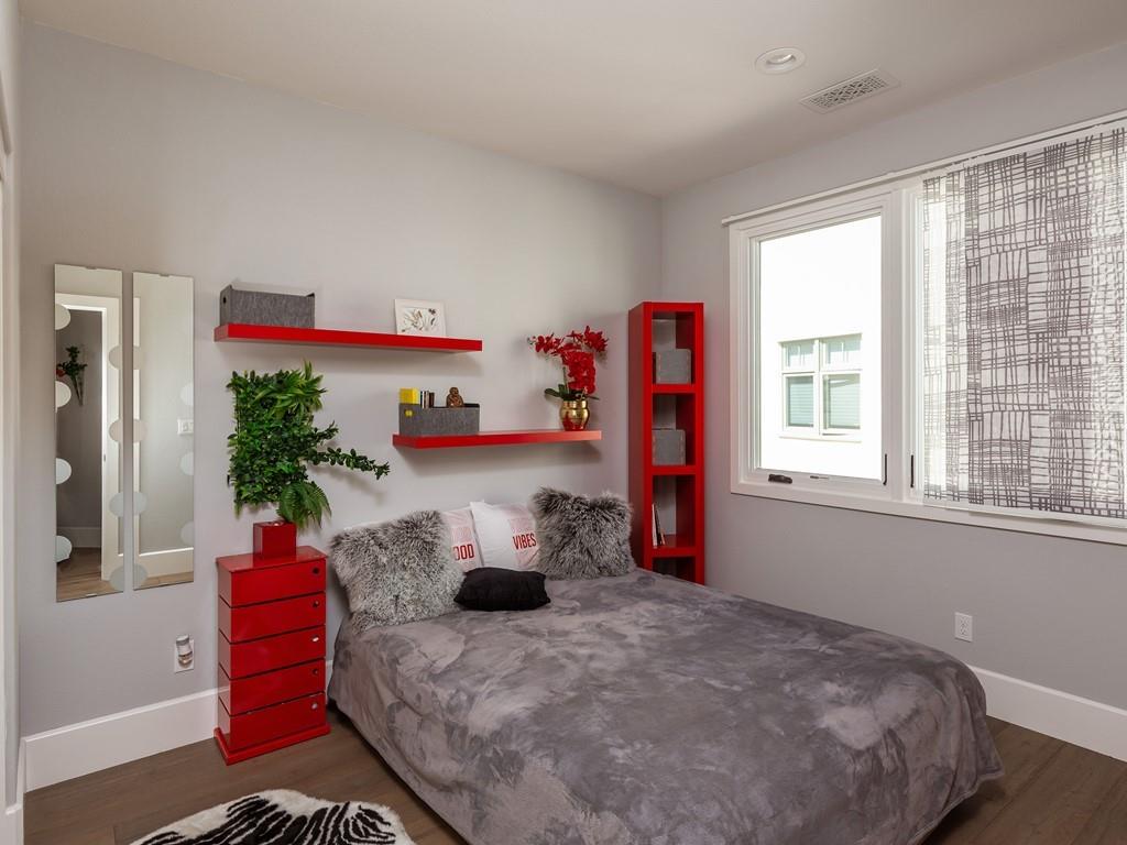 526 Fierro Loop Campbell, CA 95008 - Photo 18 of 27 a bedroom with bed and a potted plant