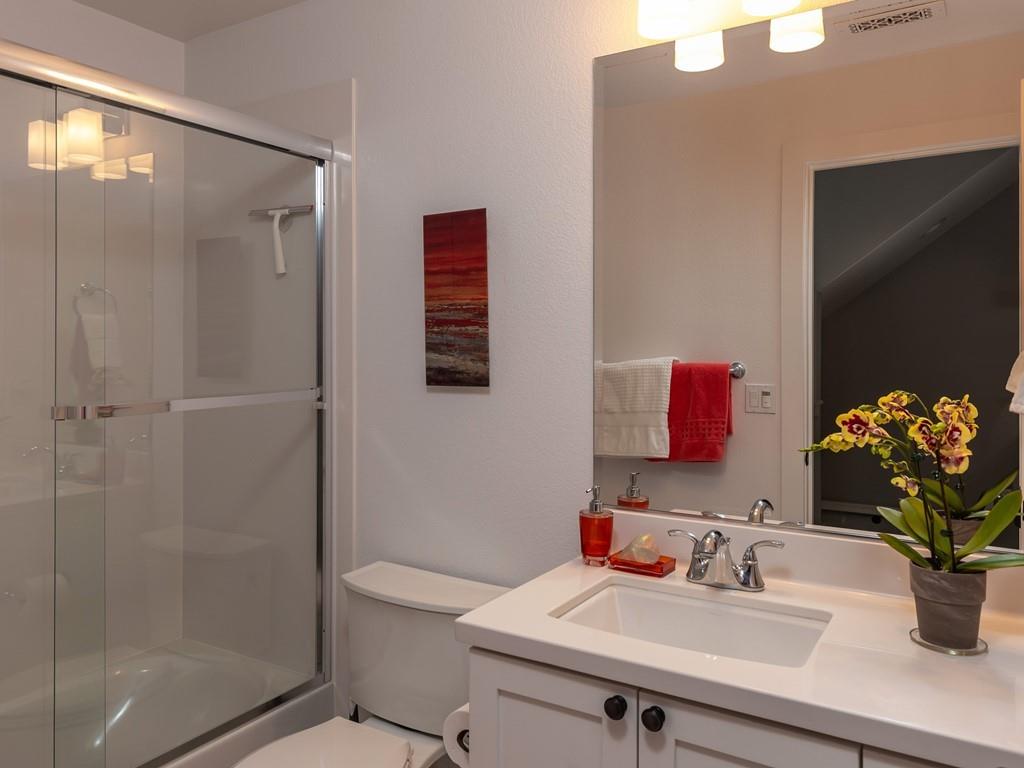 526 Fierro Loop Campbell, CA 95008 - Photo 20 of 27 a bathroom with a sink toilet and shower