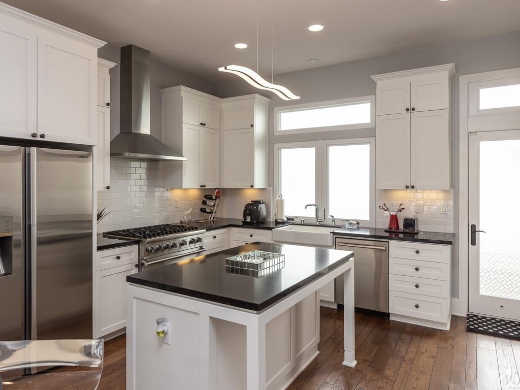 526 Fierro Loop Campbell, CA 95008 - Photo 6 of 27 a kitchen with a sink stove top oven and cabinets