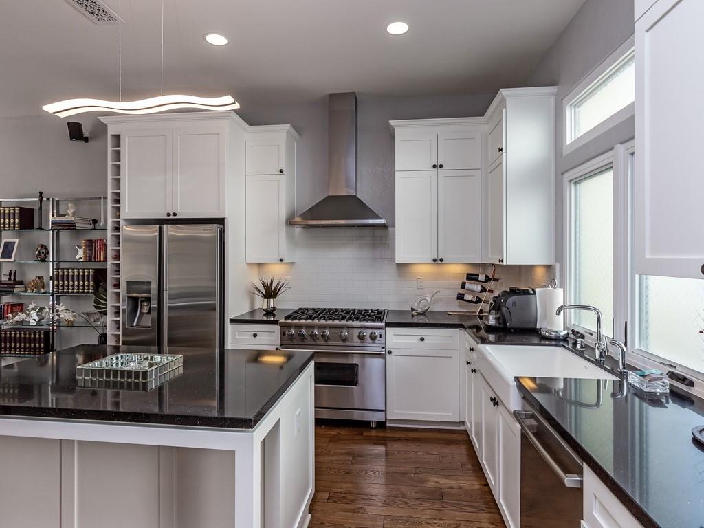526 Fierro Loop Campbell, CA 95008 - Photo 7 of 27 a kitchen with stainless steel appliances granite countertop a sink a stove and a refrigerator