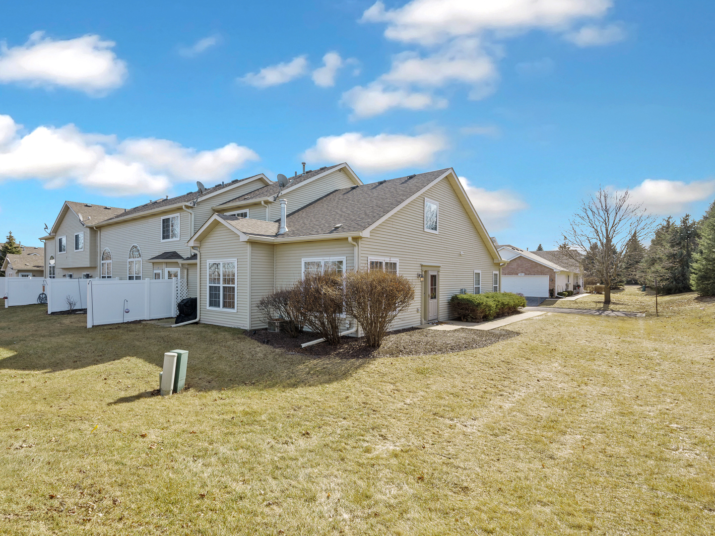 26 Rolling Oaks Road Sugar Grove, IL 60554 - Photo 3 of 25 a view of a house with a yard covered in snow