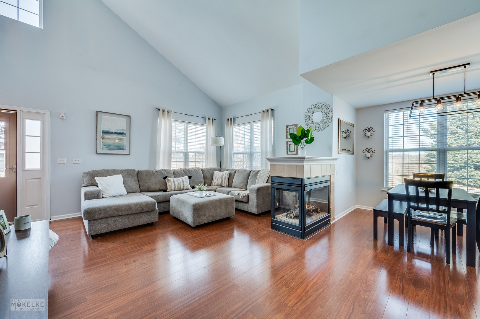 26 Rolling Oaks Road Sugar Grove, IL 60554 - Photo 5 of 25 a living room with fireplace furniture and a wooden floor
